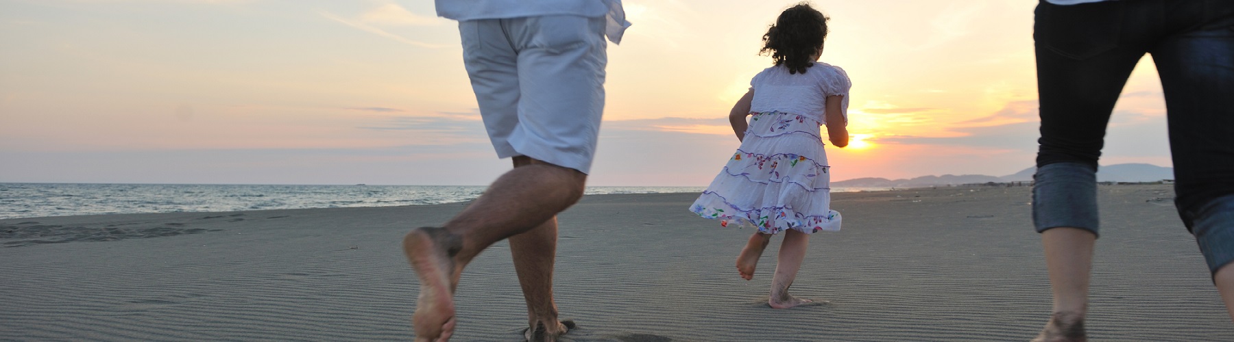 Personal insurance represented by family on the beach